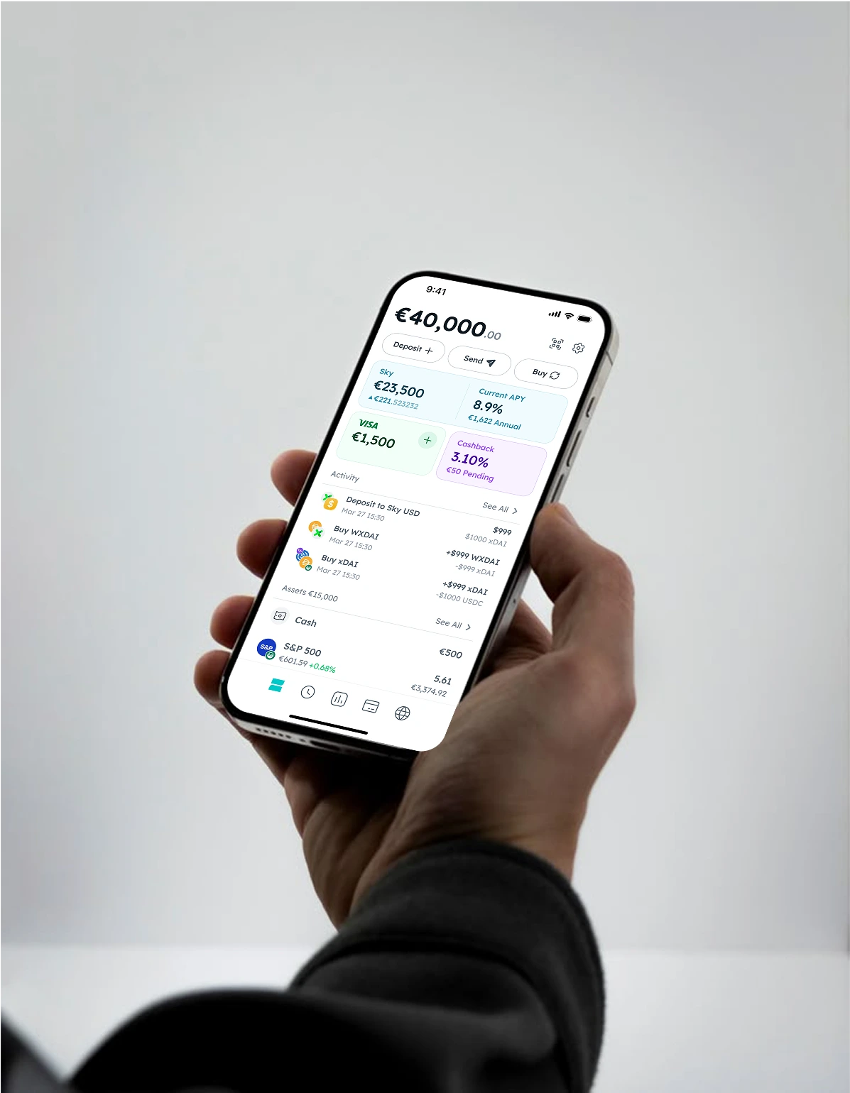 Hand holding a smartphone showing the Zeal finance app dashboard with €40,000 balance, savings yield and card options.